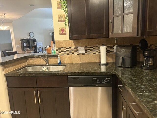 5350 E Deer Valley Dr Unit 3267, Phoenix, AZ 85054 - kitchen featuring dishwasher, dark brown cabinetry, a sink, decorative backsplash, and dark stone countertops