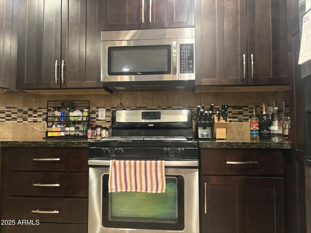 5350 E Deer Valley Dr Unit 3267, Phoenix, AZ 85054 - kitchen featuring stainless steel appliances, dark brown cabinetry, and tasteful backsplash