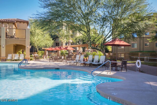 5350 E Deer Valley Dr Unit 3267, Phoenix, AZ 85054 - community pool featuring a patio area