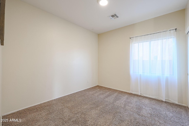 view of carpeted spare room