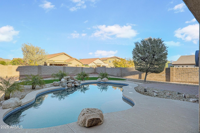 view of pool featuring a patio