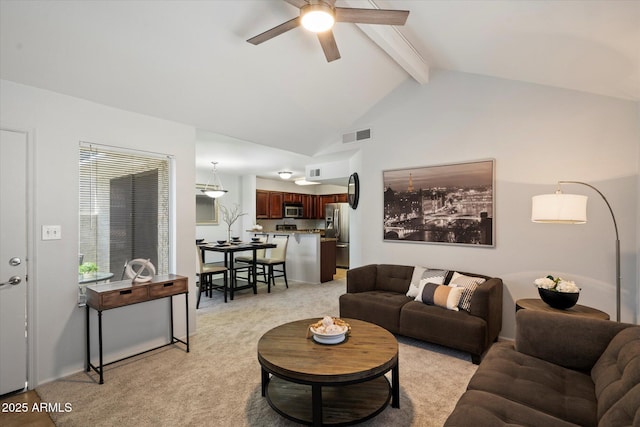 10115 E Mountain View Rd Unit 2061, Scottsdale, AZ 85258 - living area featuring beamed ceiling, a ceiling fan, light colored carpet, and high vaulted ceiling