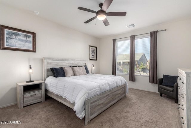 bedroom with light carpet and ceiling fan