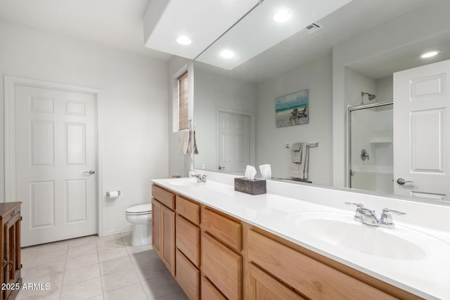 bathroom with an enclosed shower, vanity, tile patterned flooring, and toilet