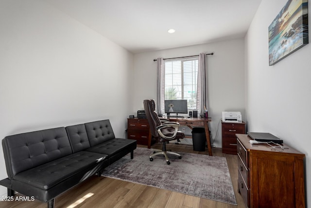 office with wood-type flooring