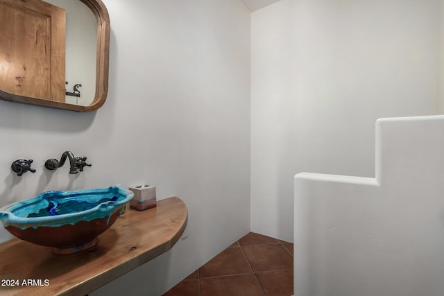 bathroom featuring tile patterned flooring and sink