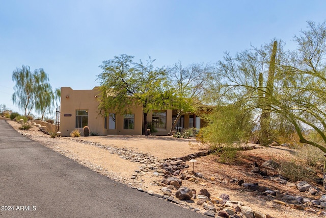 view of pueblo revival-style home