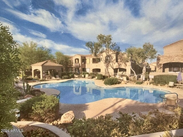 19475 N Grayhawk Dr Unit 1115, Scottsdale, AZ 85255 - community pool with a gazebo and a patio area