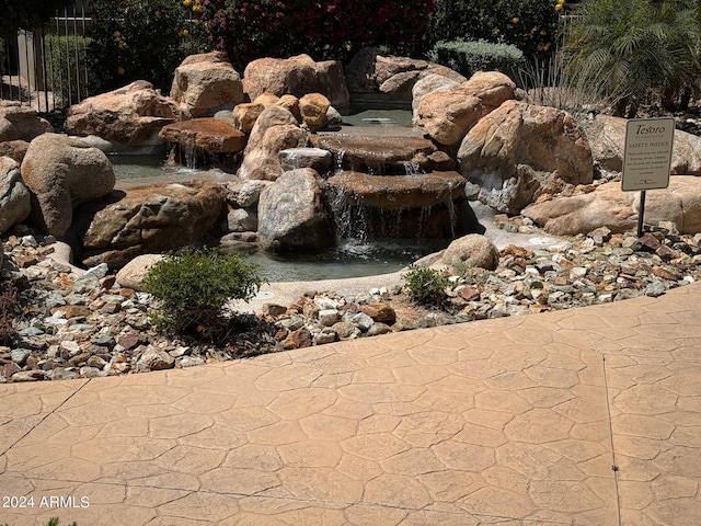 19475 N Grayhawk Dr Unit 1115, Scottsdale, AZ 85255 - exterior view of a garden pond