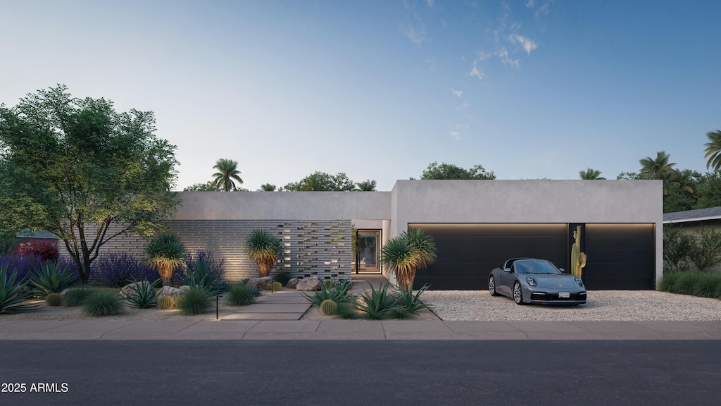 view of front of property featuring a garage