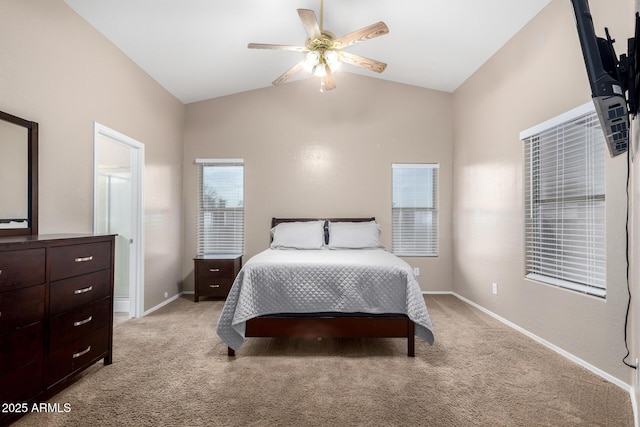 bedroom featuring lofted ceiling, light colored carpet, and ceiling fan