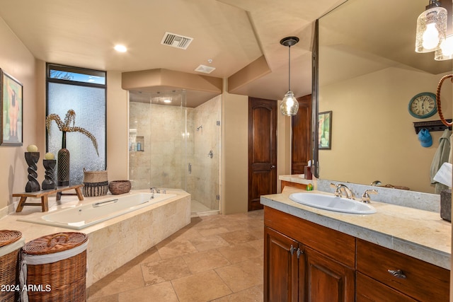 bathroom featuring plus walk in shower, tile floors, and large vanity