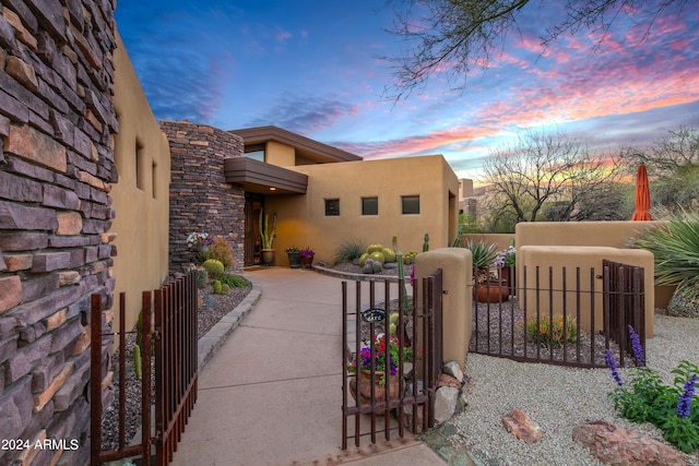 view of pueblo revival-style home