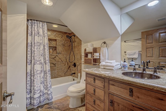 bathroom featuring toilet, shower / bath combo, vanity, and visible vents