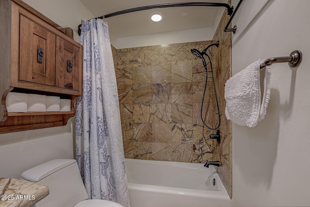 full bath featuring toilet and shower / bath combo with shower curtain