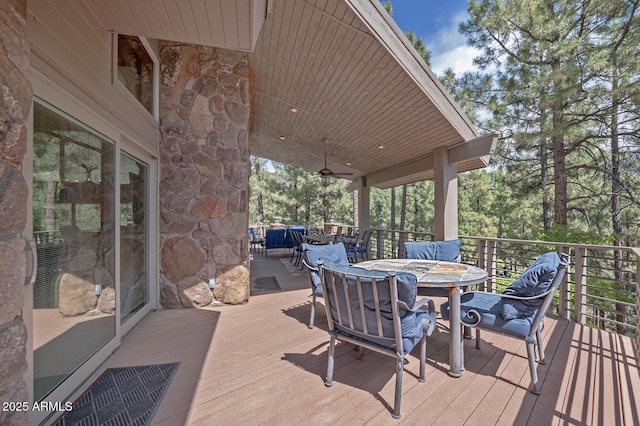 deck with a ceiling fan and outdoor dining space