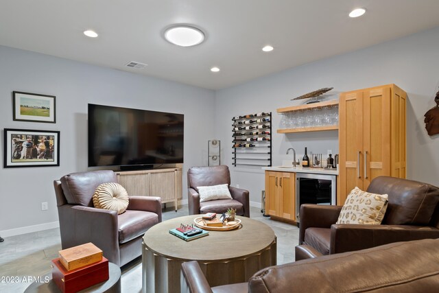 living room featuring indoor bar and wine cooler