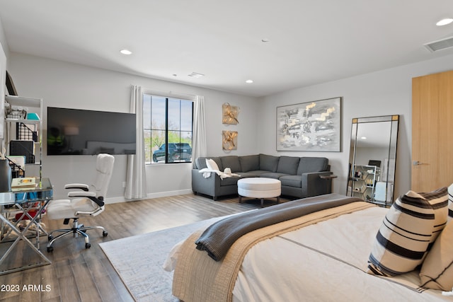 bedroom with wood-type flooring