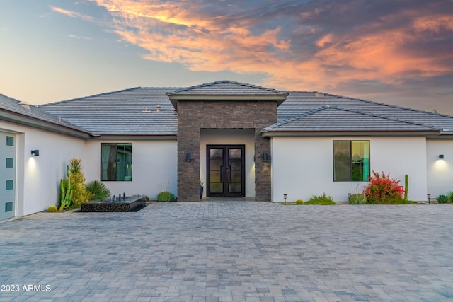 prairie-style home with french doors