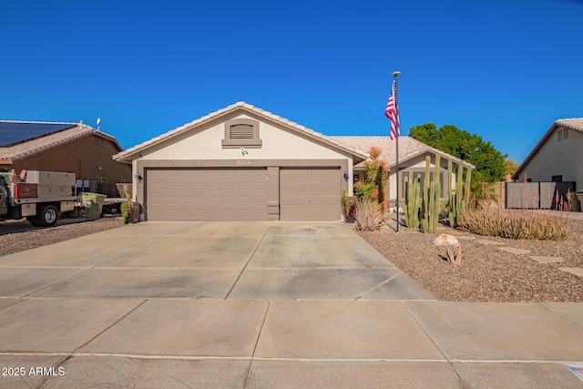 ranch-style home featuring a garage