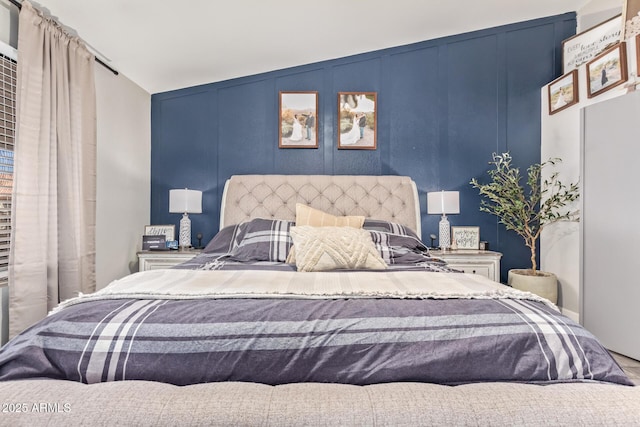 bedroom featuring lofted ceiling