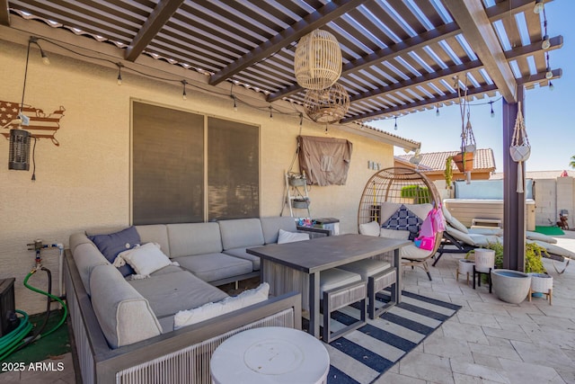 view of patio / terrace featuring outdoor lounge area and a pergola