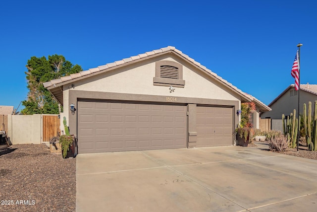 ranch-style home with a garage