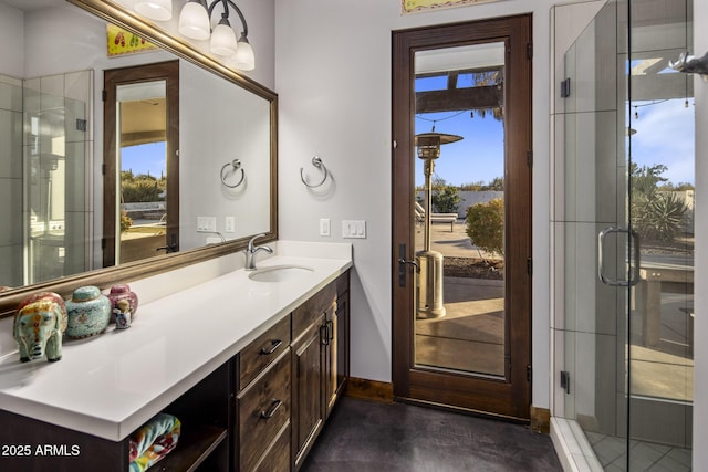 bathroom with vanity and walk in shower