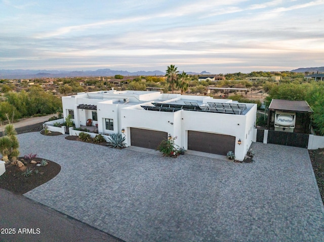 birds eye view of property with a mountain view