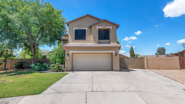 5787 W Barbara Ave, Glendale, AZ 85302 - traditional-style home with a garage, driveway, stucco siding, and a tile roof