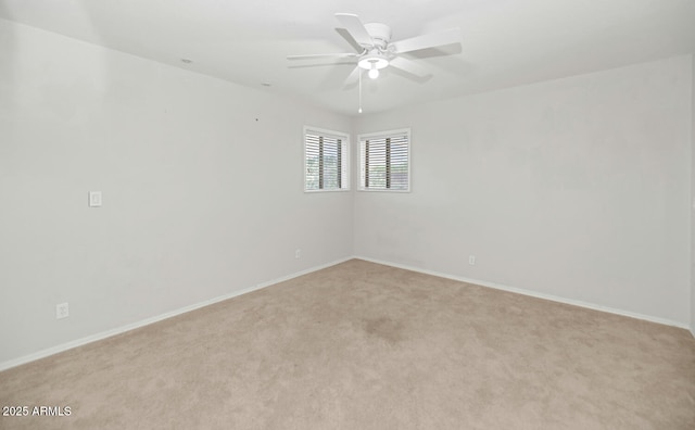 5787 W Barbara Ave, Glendale, AZ 85302 - empty room with light colored carpet, a ceiling fan, and baseboards