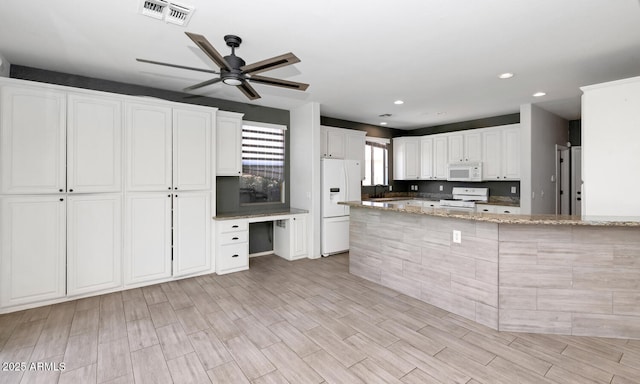 5787 W Barbara Ave, Glendale, AZ 85302 - kitchen featuring white appliances, a ceiling fan, light stone counters, white cabinets, and recessed lighting
