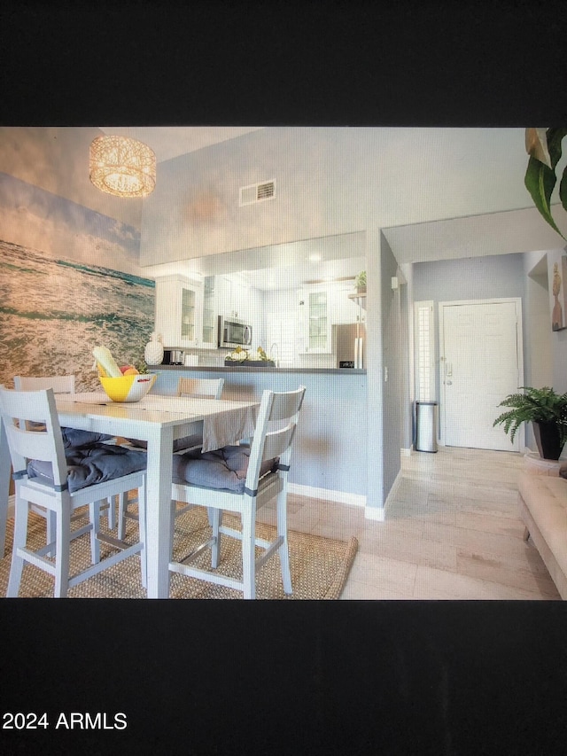 view of tiled dining room