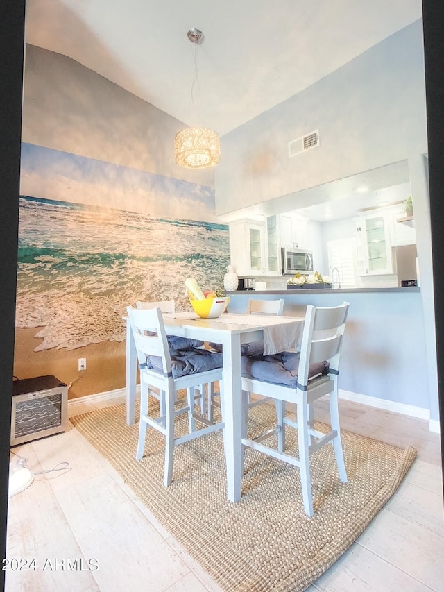 dining room featuring sink