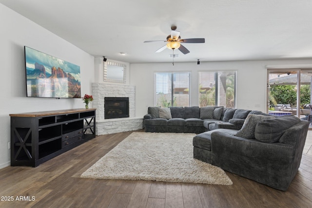 11142 E Ravenna Ave, Mesa, AZ 85212 - living area with ceiling fan, wood finished floors, healthy amount of natural light, and a fireplace