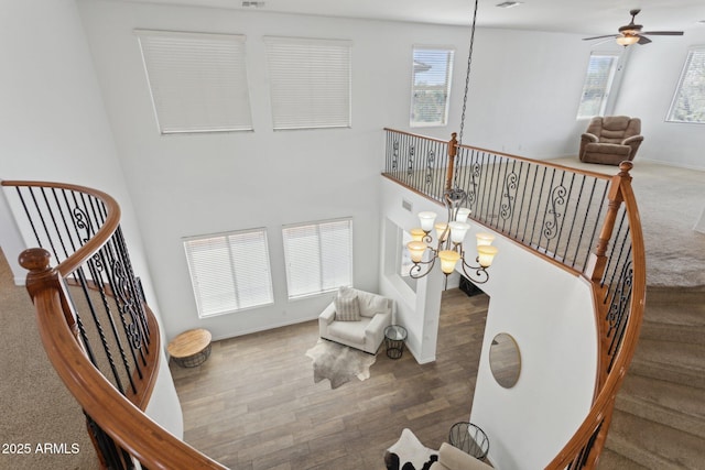 11142 E Ravenna Ave, Mesa, AZ 85212 - stairs with ceiling fan and wood finished floors