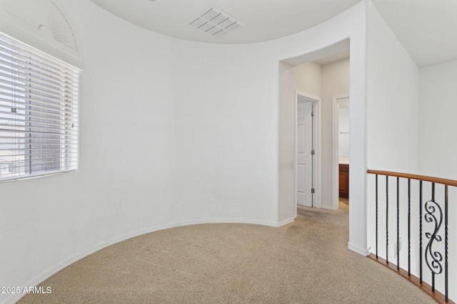 11142 E Ravenna Ave, Mesa, AZ 85212 - hallway featuring light colored carpet and baseboards