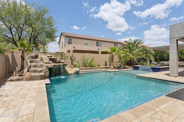 11142 E Ravenna Ave, Mesa, AZ 85212 - view of swimming pool featuring a fenced backyard, a patio area, and a pool with connected hot tub