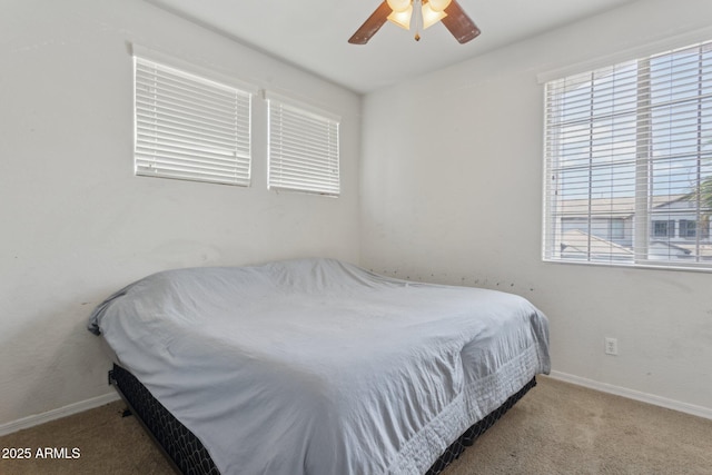 11142 E Ravenna Ave, Mesa, AZ 85212 - bedroom featuring carpet flooring, baseboards, and ceiling fan