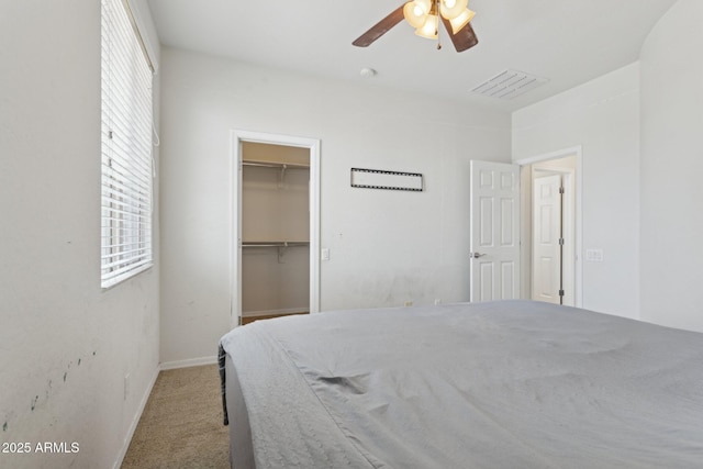 11142 E Ravenna Ave, Mesa, AZ 85212 - bedroom featuring carpet flooring, a spacious closet, ceiling fan, baseboards, and a closet