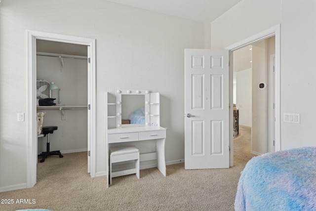 11142 E Ravenna Ave, Mesa, AZ 85212 - carpeted bedroom featuring a spacious closet, baseboards, and a closet