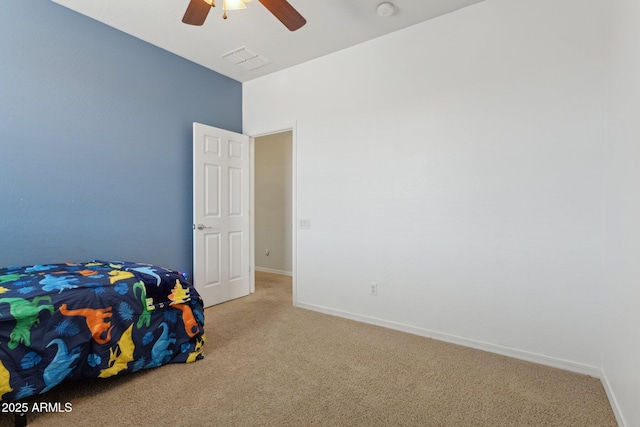 11142 E Ravenna Ave, Mesa, AZ 85212 - unfurnished bedroom with carpet, baseboards, and ceiling fan