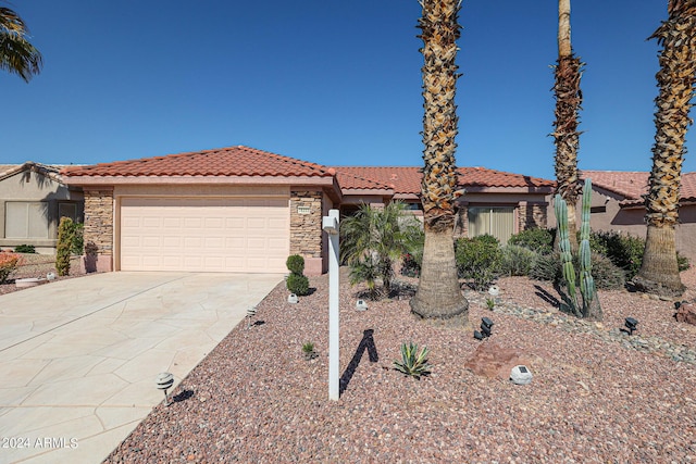 view of front of property with a garage