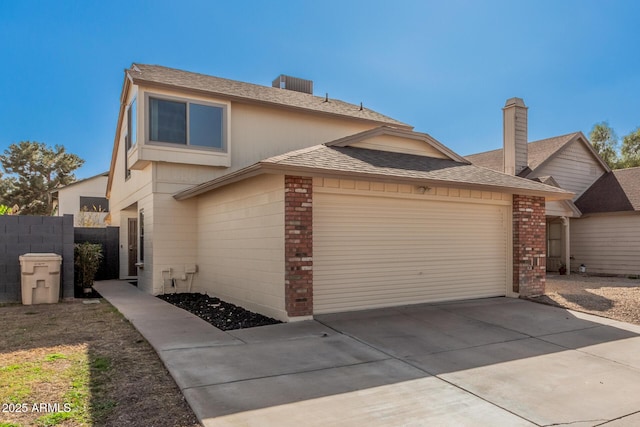 exterior space featuring a garage and central AC unit