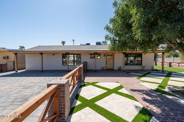 view of front facade with a patio