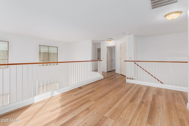 empty room with light wood-type flooring