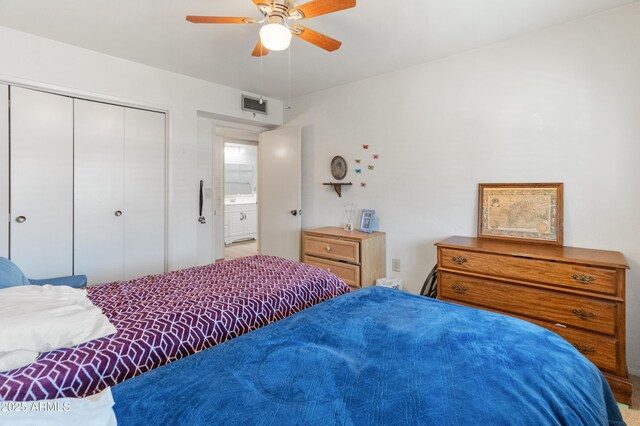 10228 W Concord Ave, Sun City, AZ 85351 - bedroom featuring a closet and a ceiling fan