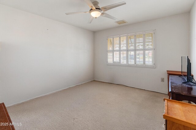 10228 W Concord Ave, Sun City, AZ 85351 - carpeted empty room with ceiling fan