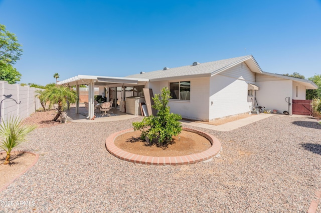 10228 W Concord Ave, Sun City, AZ 85351 - rear view of property with a fenced backyard and a patio
