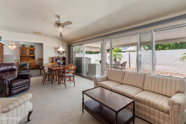 10228 W Concord Ave, Sun City, AZ 85351 - living room with ceiling fan and light colored carpet